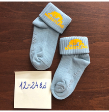 Baba zokni - sárga összekapaszkodós mintával - világoskék zoknin (12-24hó)