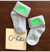 Baba zokni - neon zöldösszekapaszkodós mintával - világoskék zoknin (0-6hó)