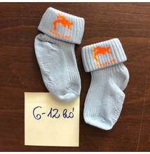 Baba zokni - neon narancssárga új dobós mintával - világoskék zoknin (6-12hó)