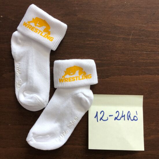 Baba zokni - sárga összekapaszkodós mintával - fehér zoknin (12-24hó)