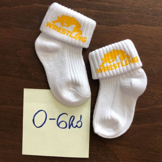 Baba zokni -sárga összekapaszkodós mintával - fehér zoknin (0-6hó)